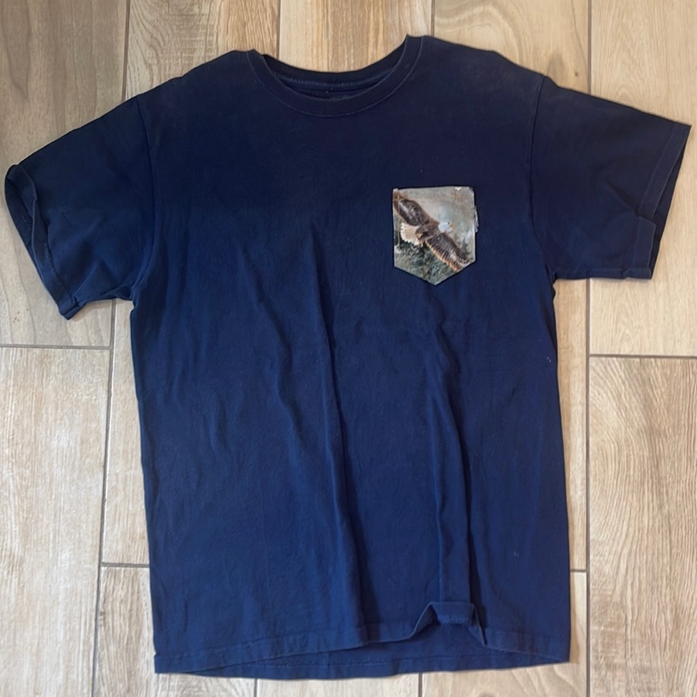 Fruit of the Loom Navy t-shirt with eagle on pocket. Good used condition size M